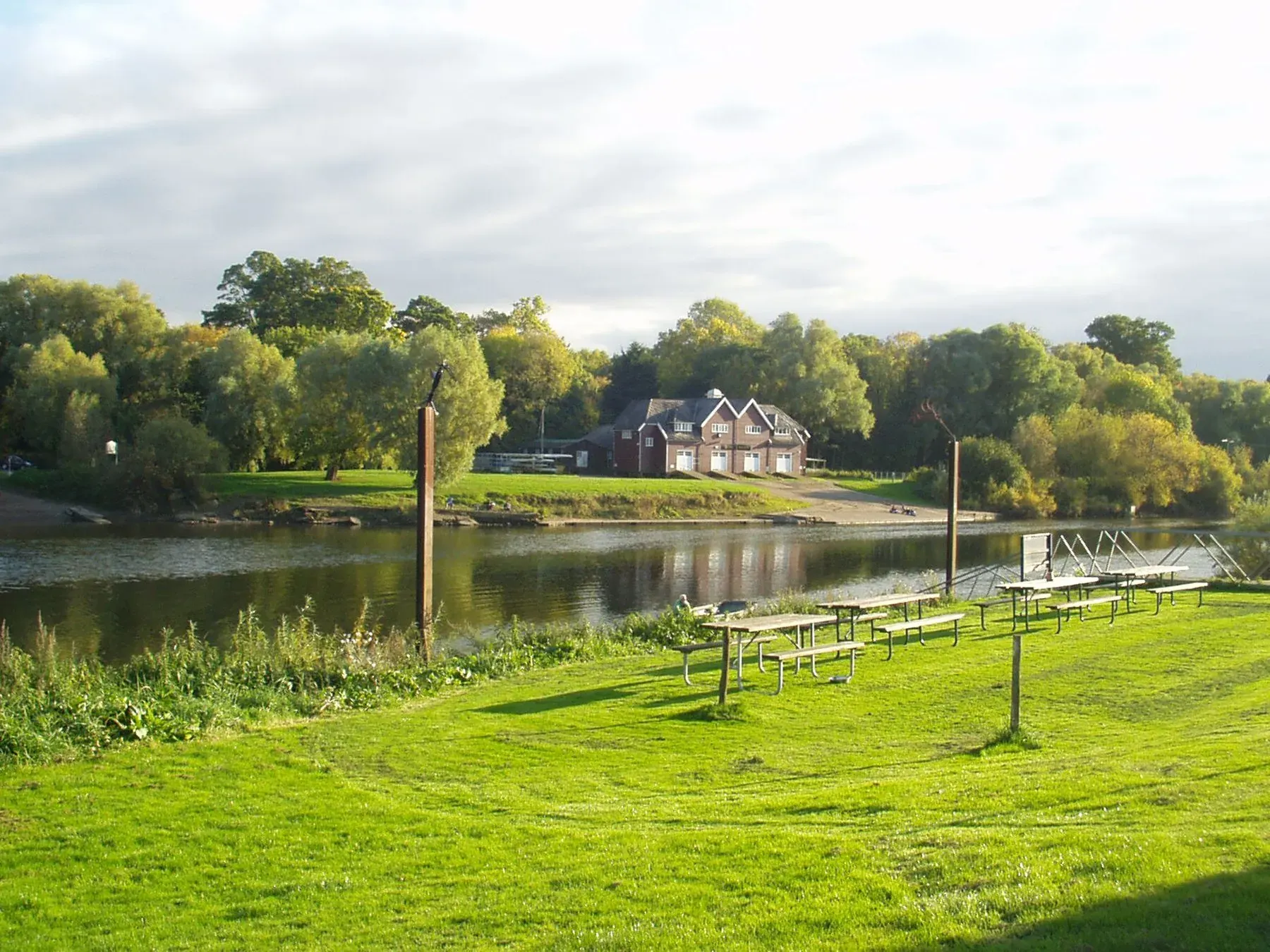 Tents on the lawn beside the River Severn
