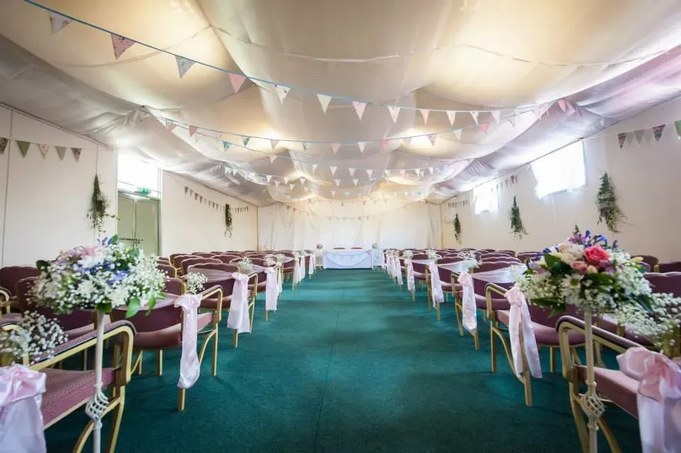 The function hall dressed for a wedding ceremony