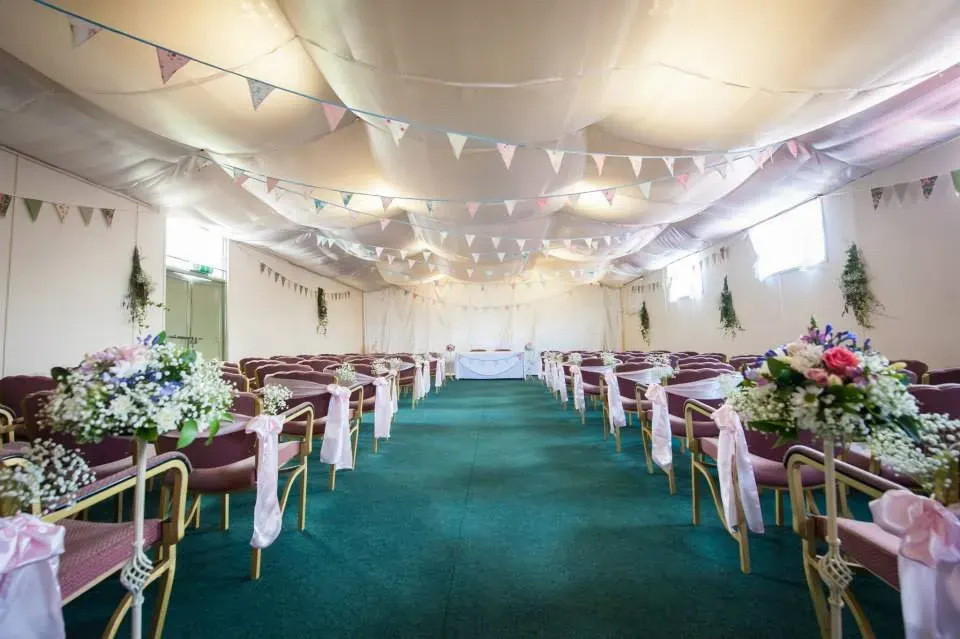 The function hall dressed for a wedding ceremony