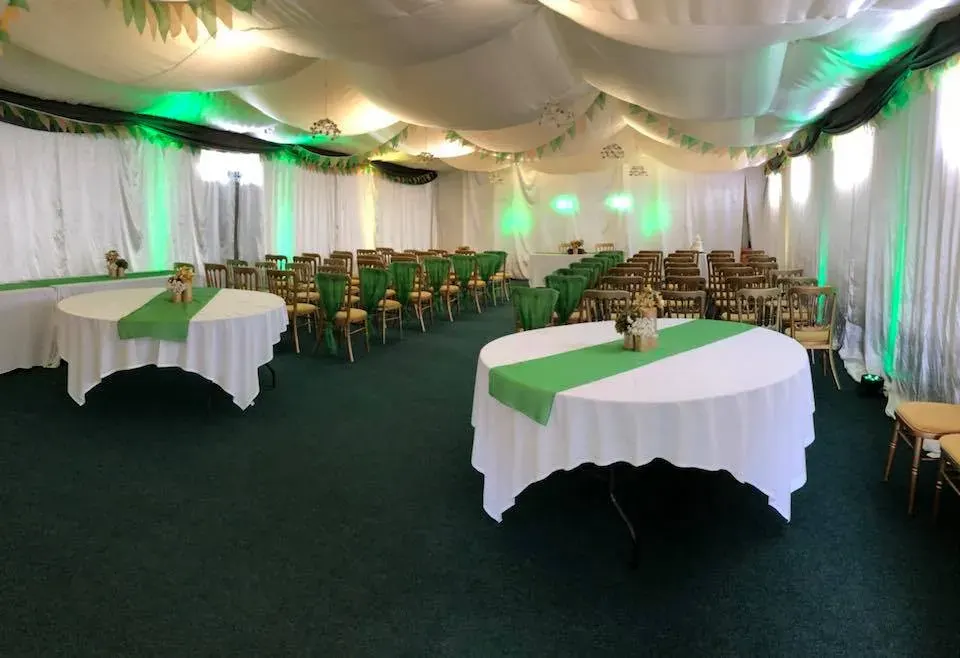 The function hall lit for an evening celebration