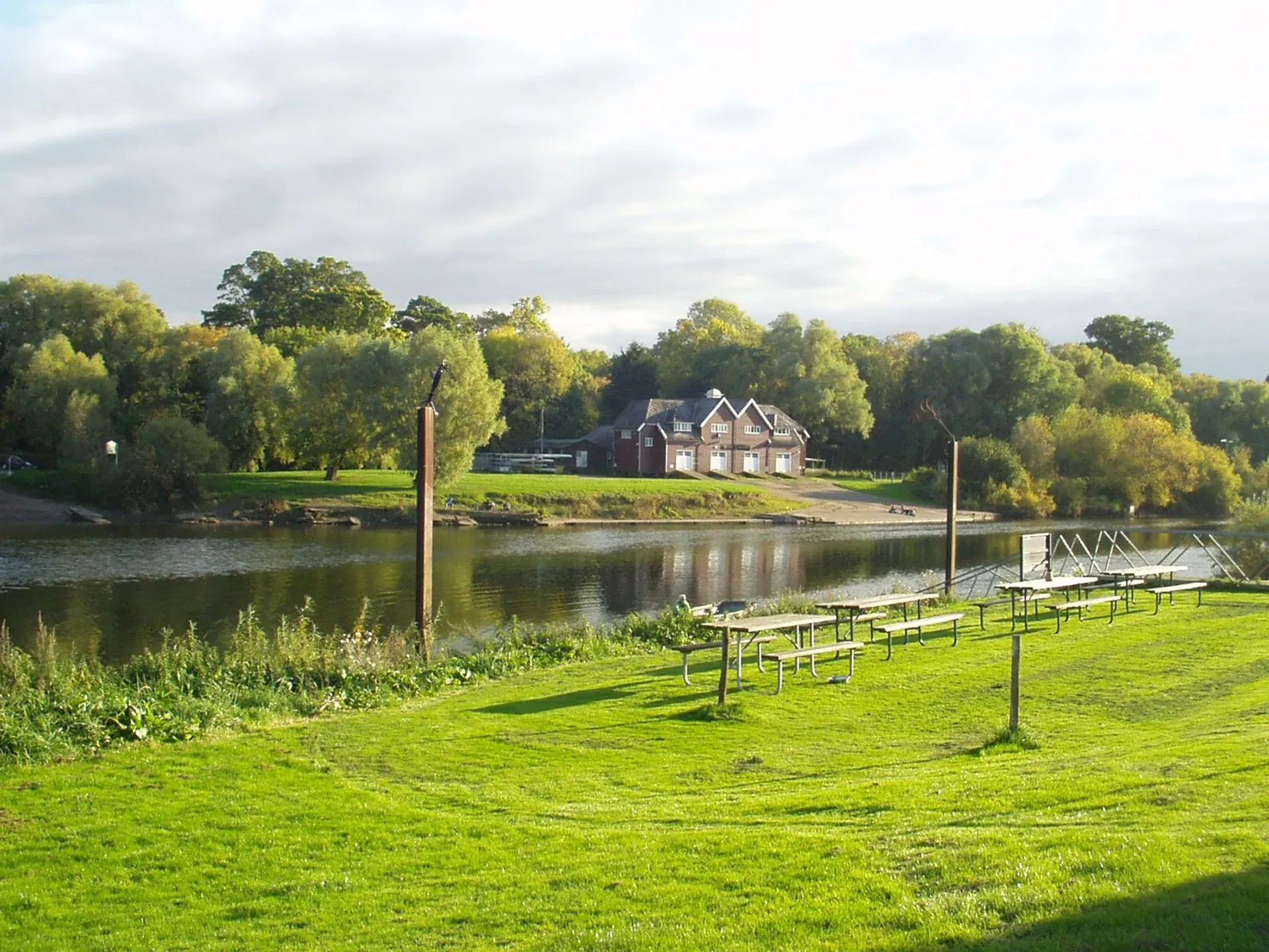 The green riverside garden at Lower Lode Inn